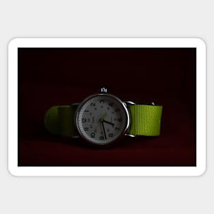 watch in the black background Sticker